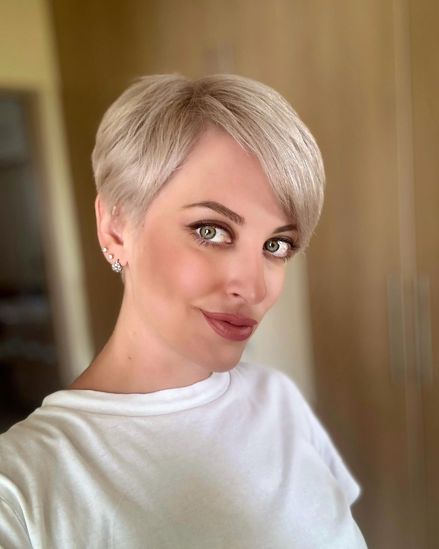 2. Platinum Pixie Elegance - Short Hairstyle Ideas for Women