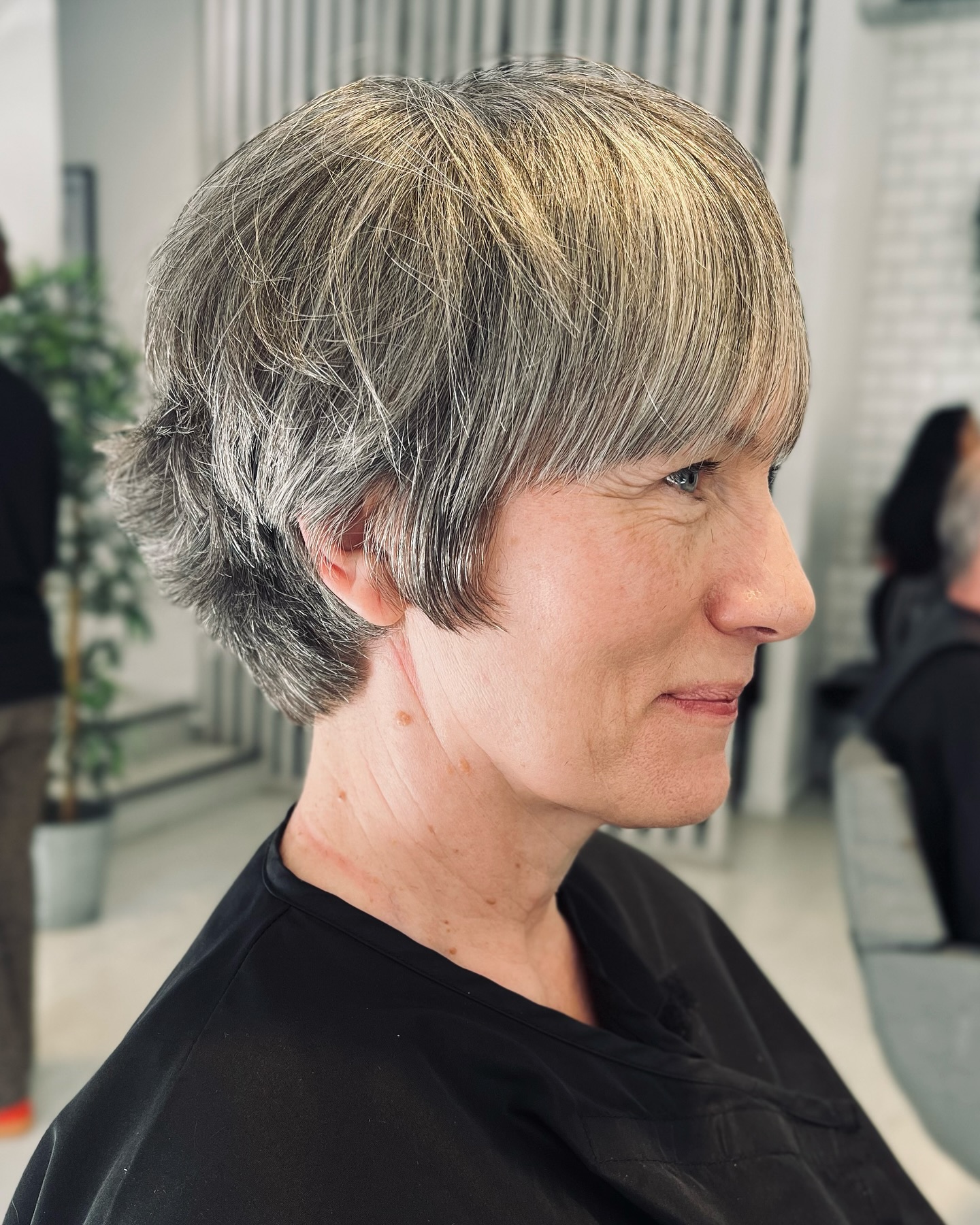12. Silver Feathered Bowl Cut - Short Hairstyle Ideas for Women