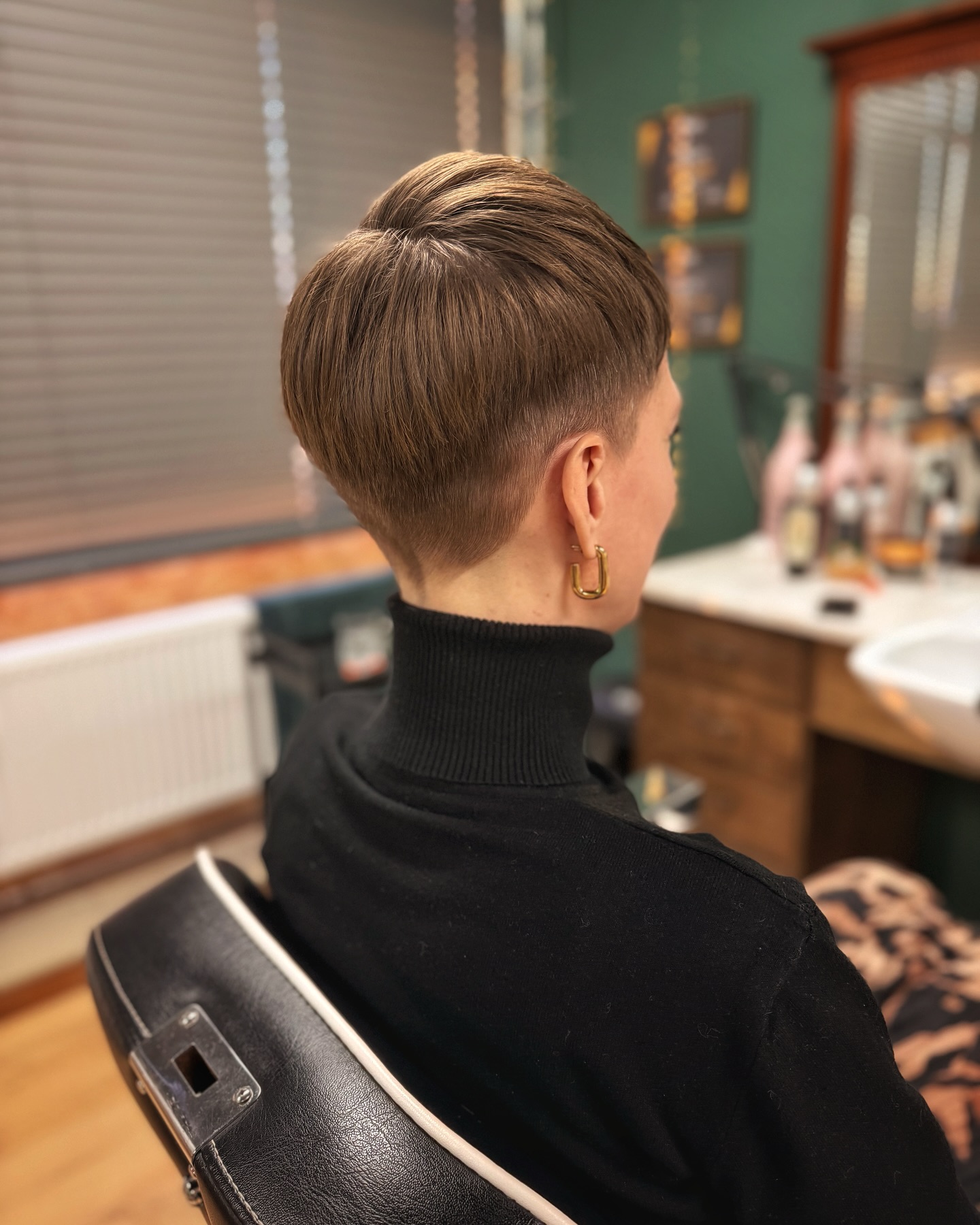 13. Sculpted Undercut Pixie in Warm Brown - Short Hairstyle Ideas for Women