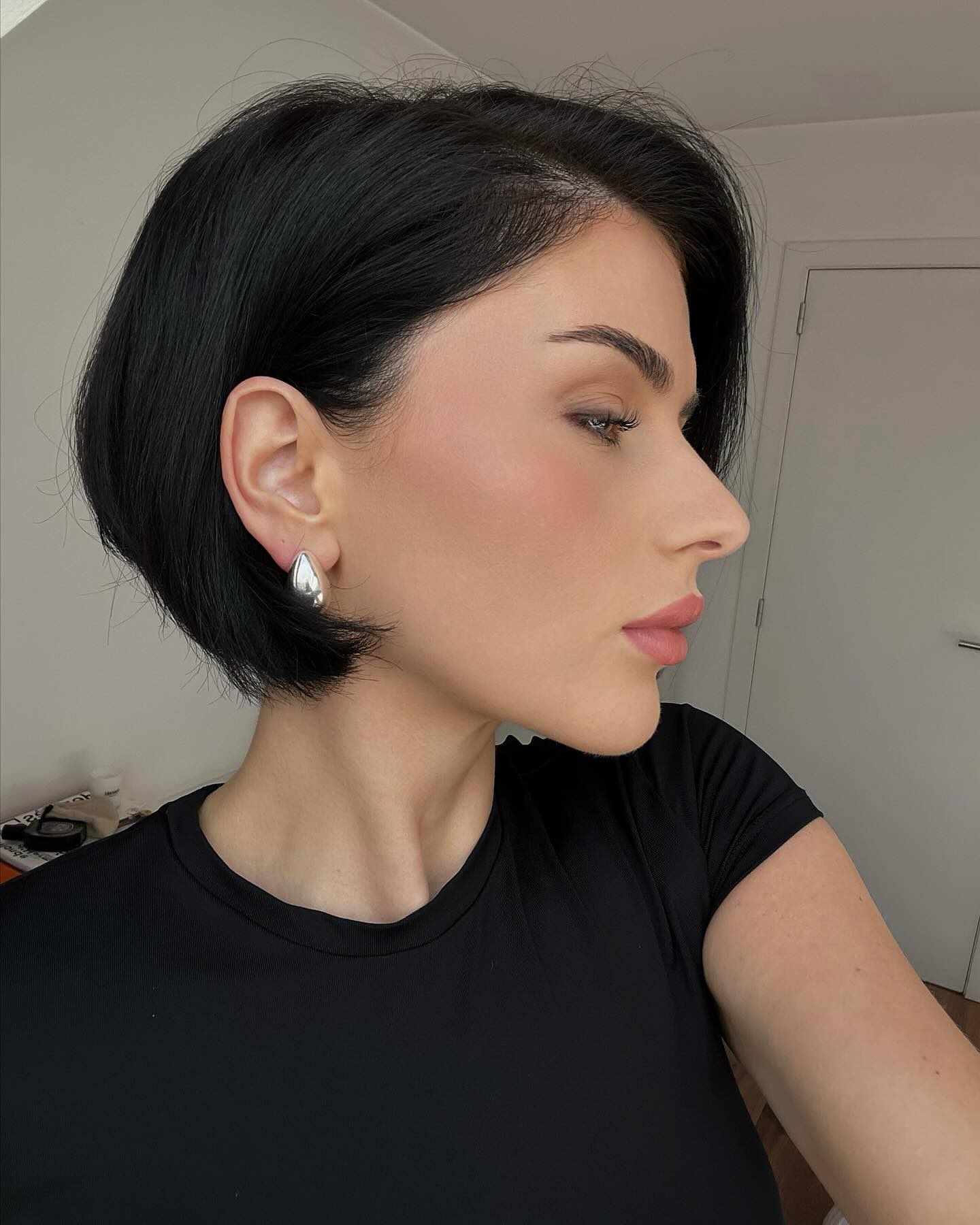 18. Glossy Black Bob with Side Part - Short Hairstyle Ideas for Women