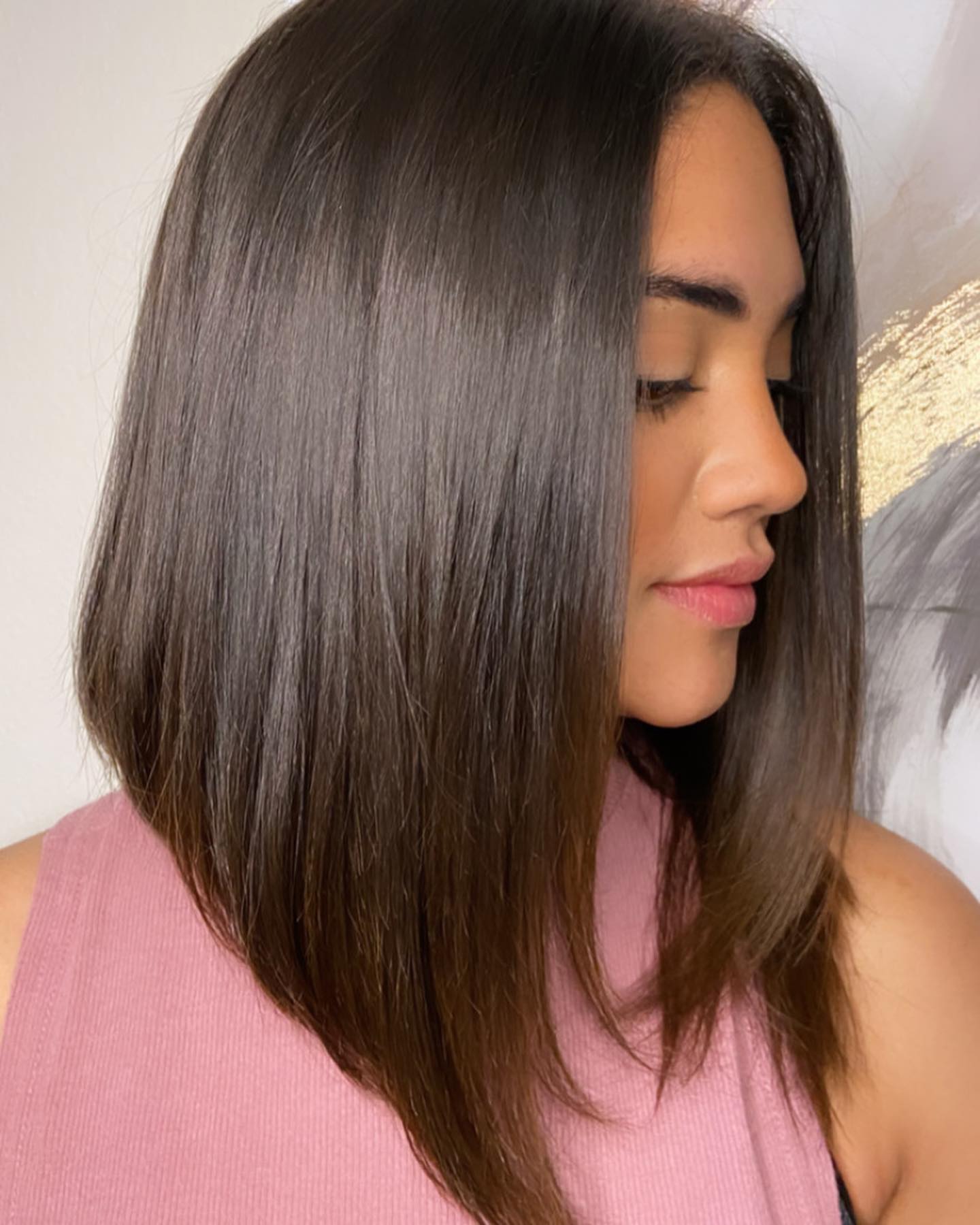 13. Silky Dark Mocha Angled Lob - Medium-Length Hairstyle Ideas for Women