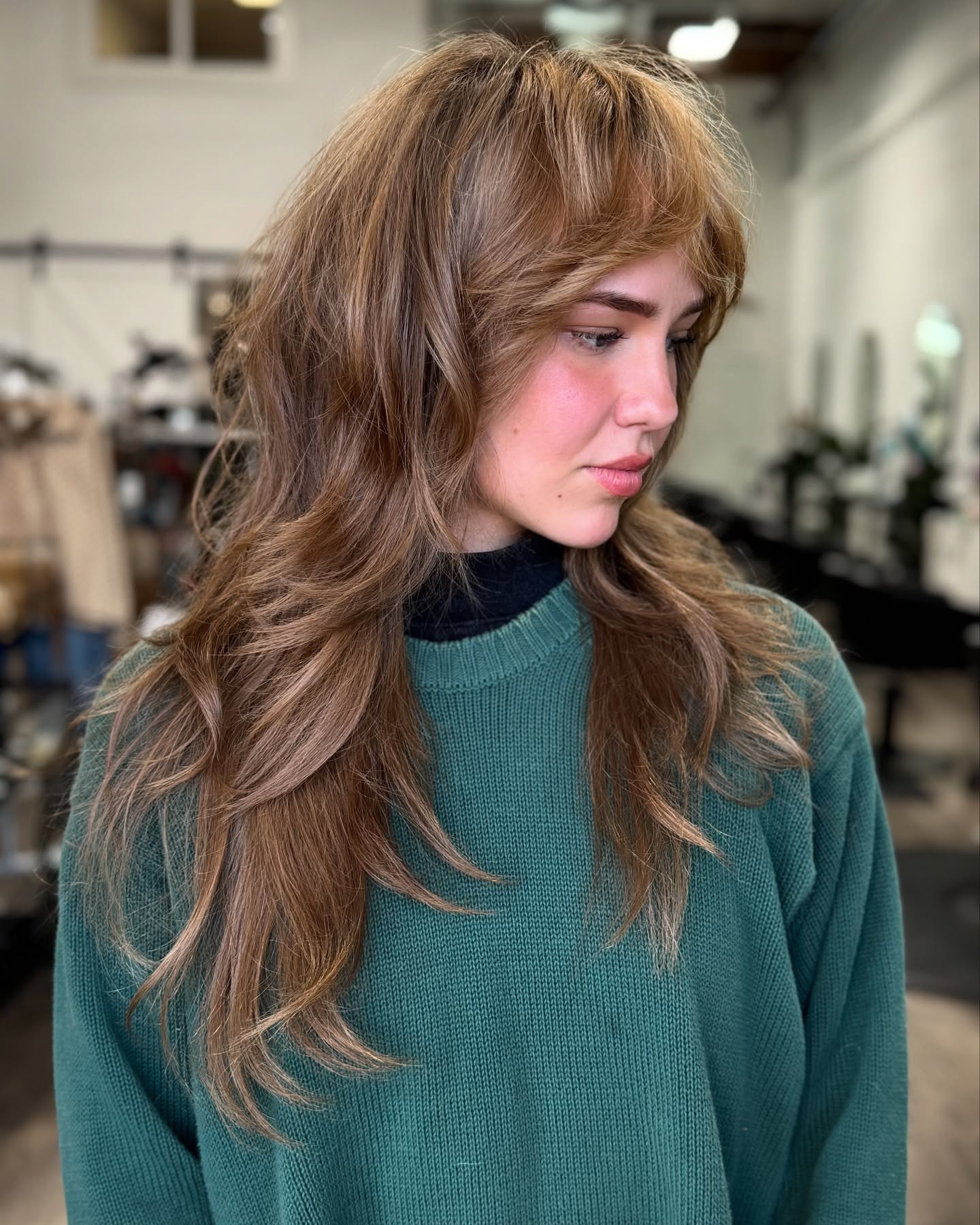 3. Cocoa Layers with Retro Curtain Bangs - Medium-Length Hairstyle Ideas for Women