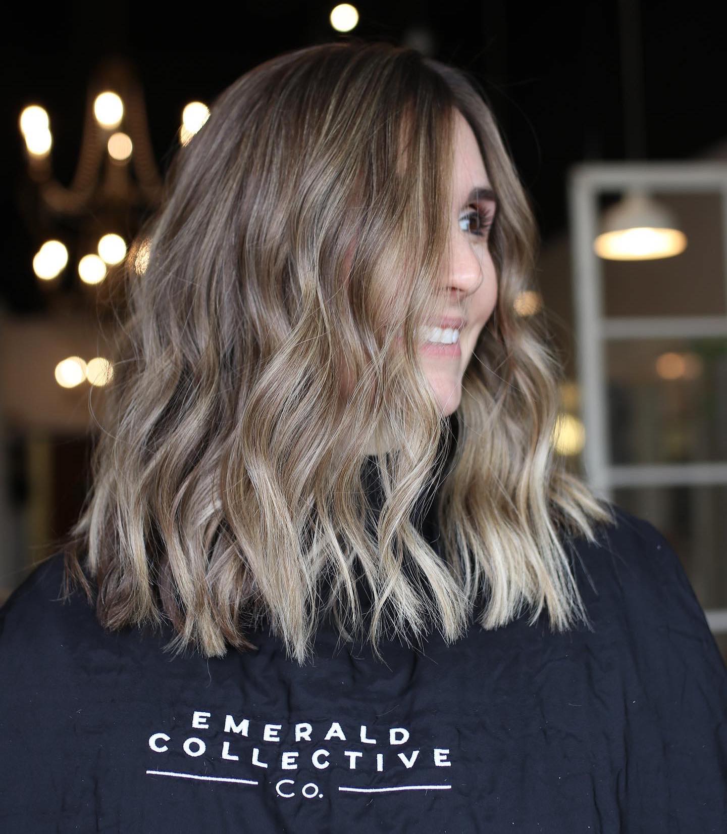 26. Cool-Toned Bronde with Loose Curls - Medium-Length Hairstyle Ideas for Women
