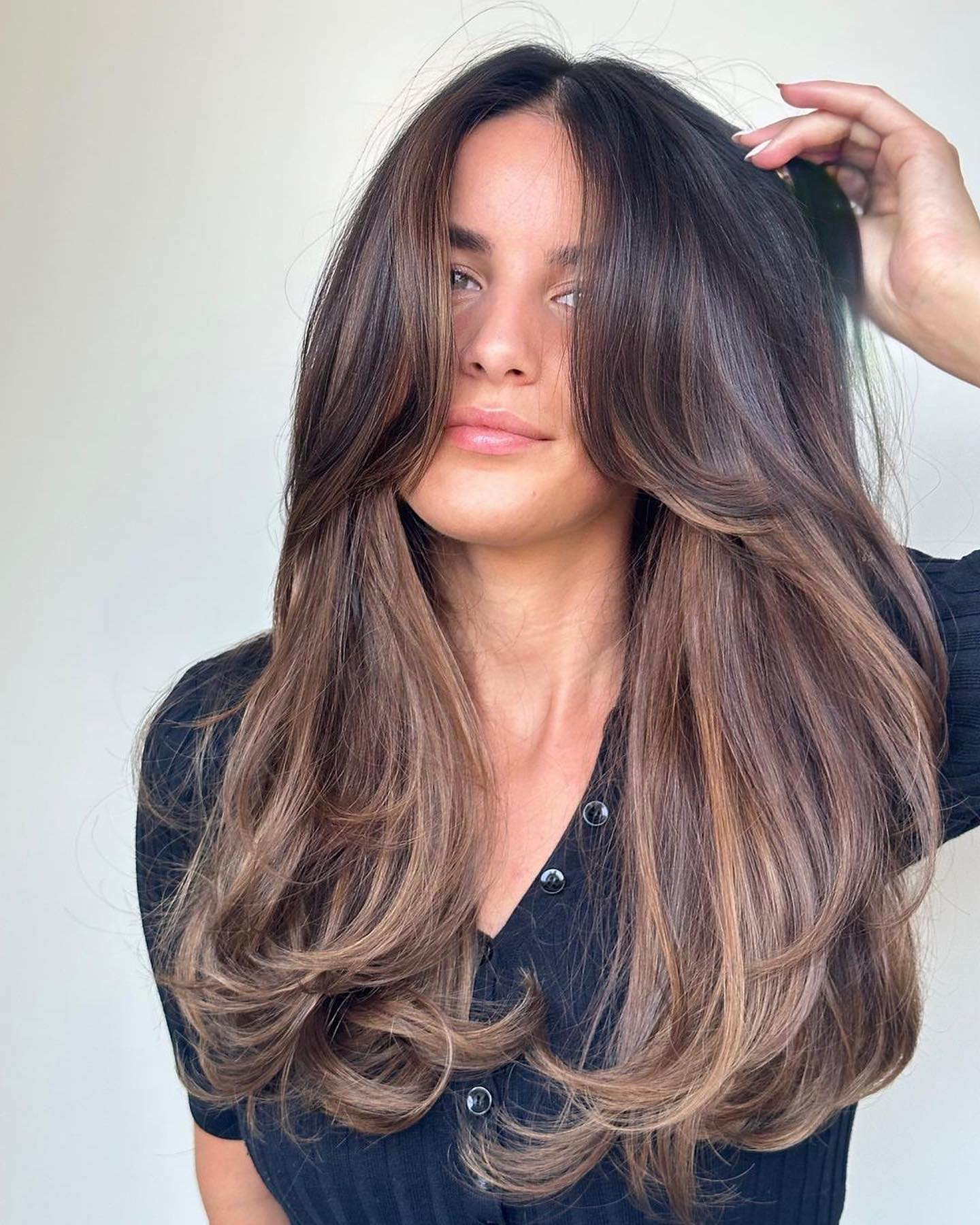 11. Smoky Brunette Blowout with Soft Curtain Layers - Long Hairstyle Ideas for Women