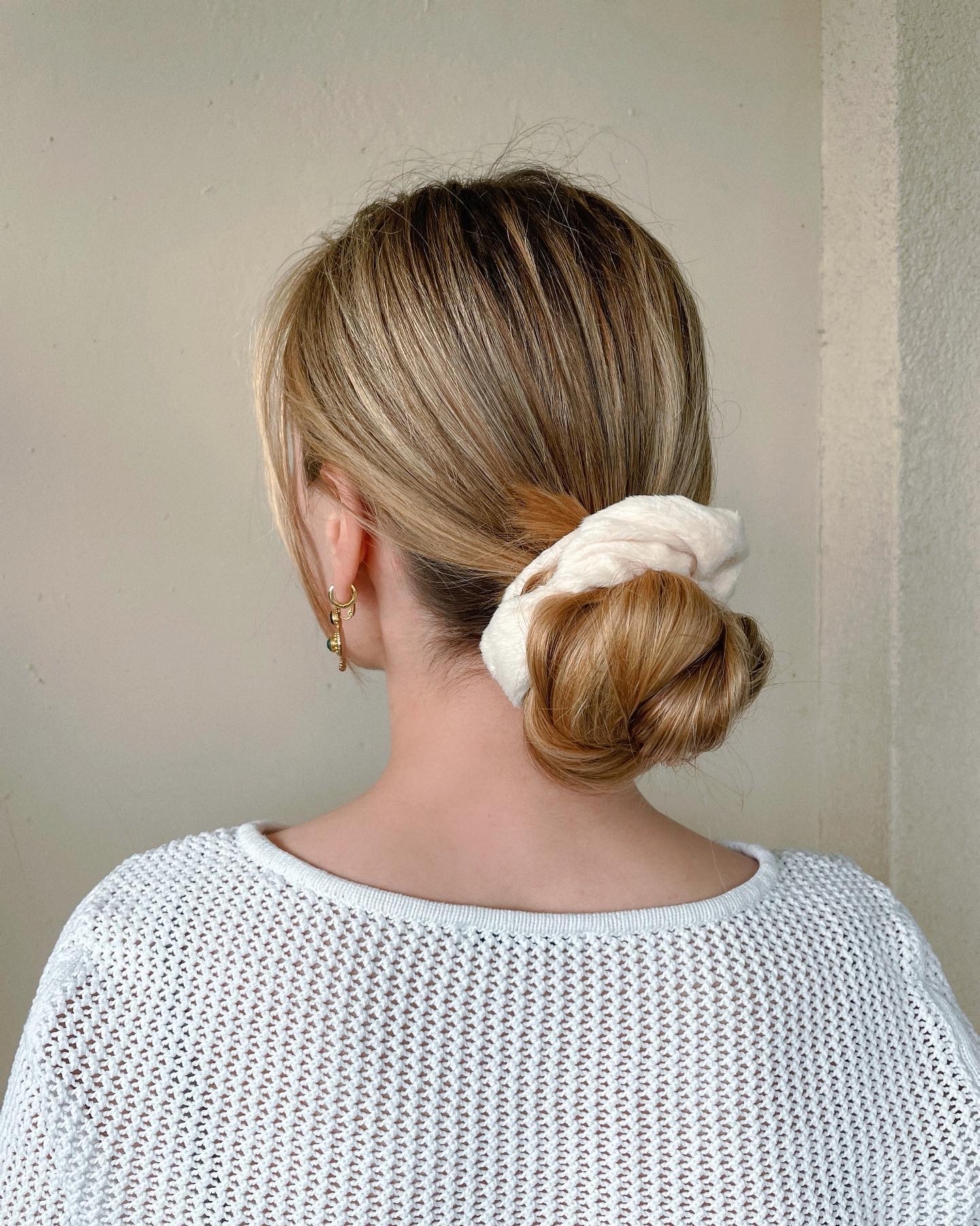 7. Low Knot with Blonde Dimension and Texture - Long Hairstyle Ideas for Women