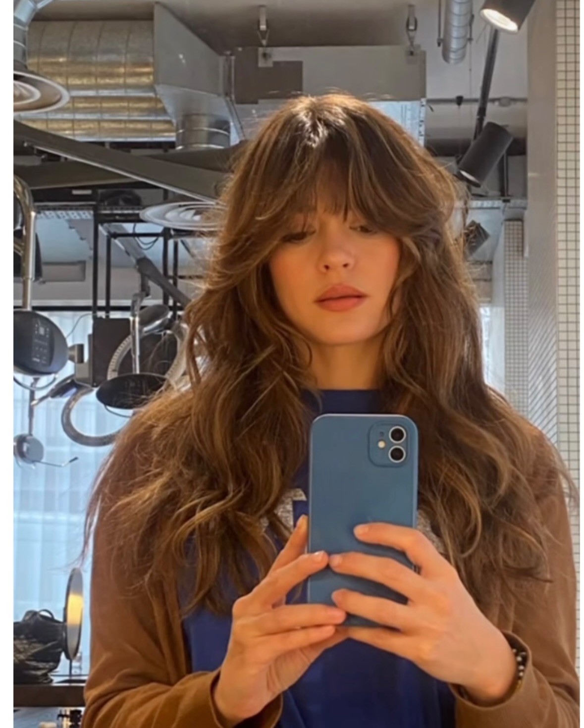 22. Tousled Chestnut Layers with Curtain Bangs - Long Hairstyle Ideas for Women