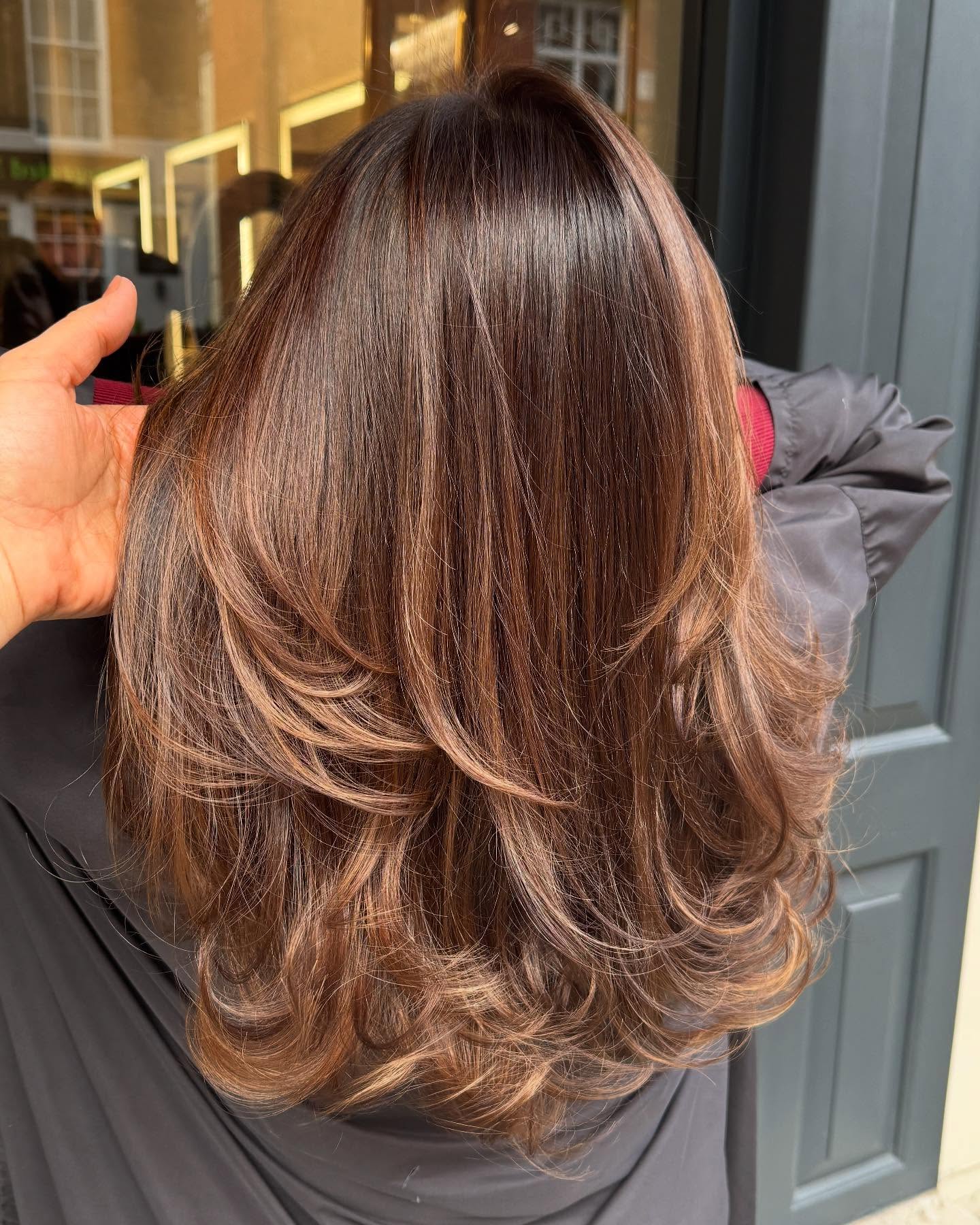 16. Toffee Brown Volume Layers with Blowout Finish - Long Hairstyle Ideas for Women