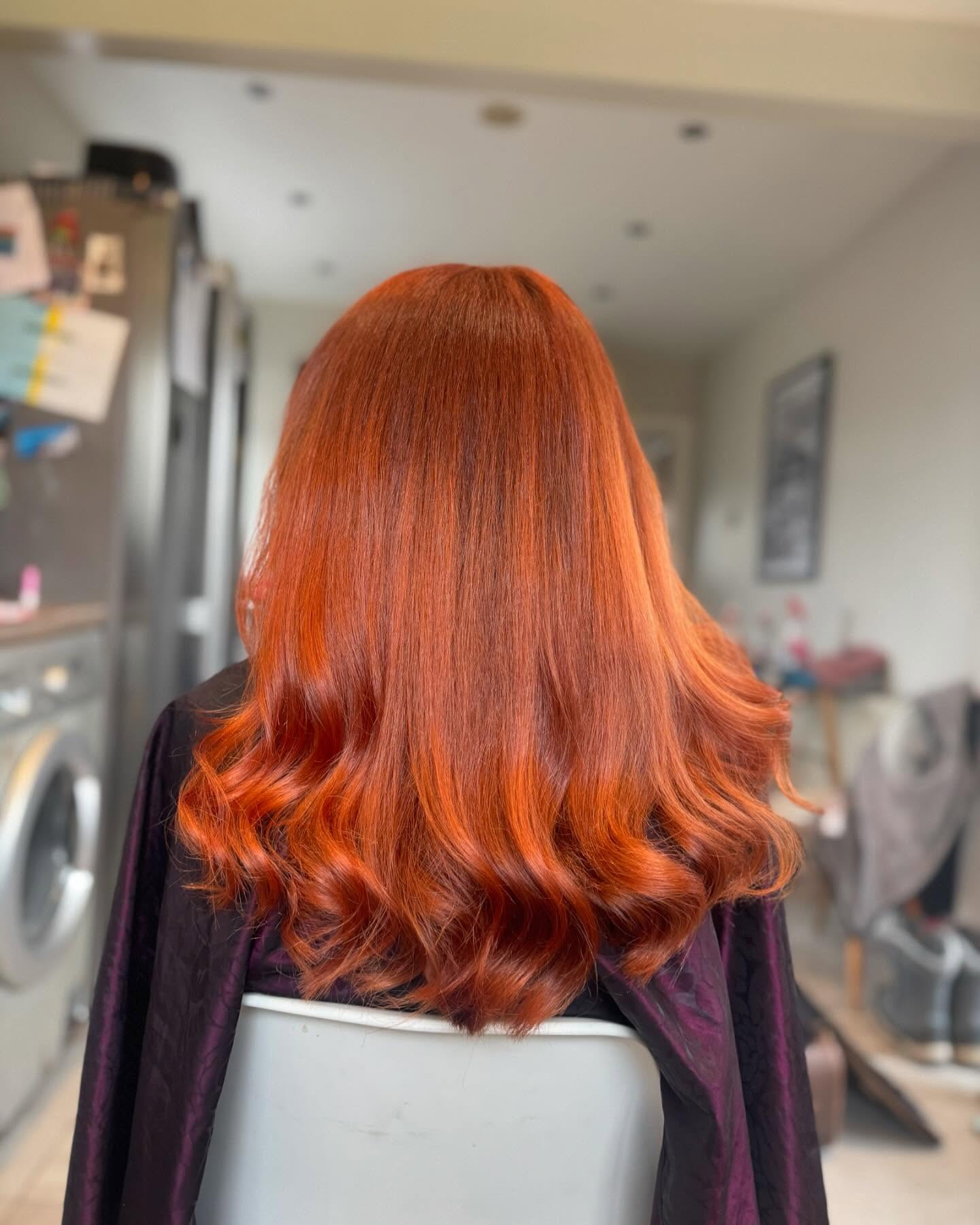 1. Glossy Copper Waves with Subtle Gradient - Copper Hair Color Ideas for Women