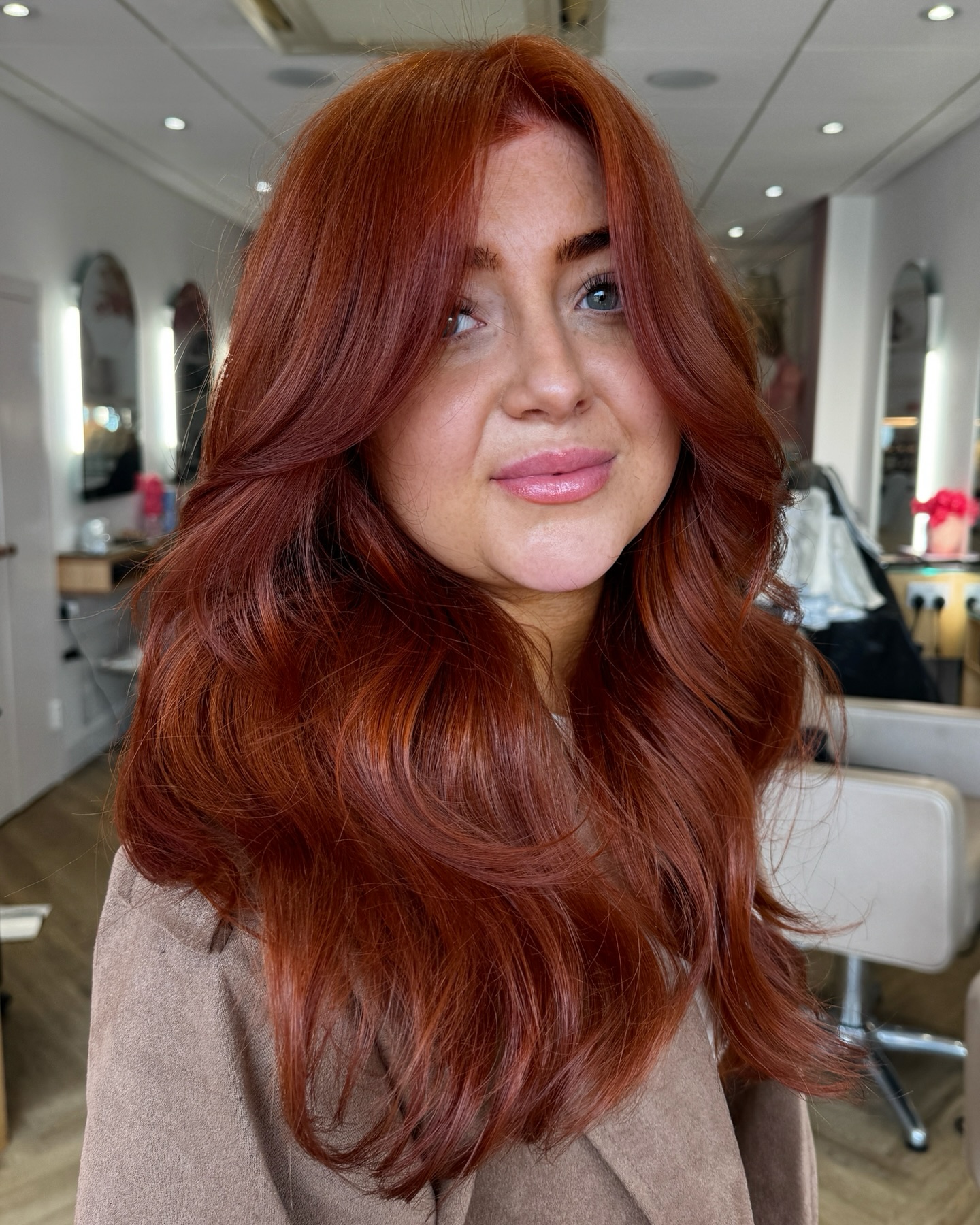 5. Classic Red Copper with Curtain Bangs - Copper Hair Color Ideas for Women