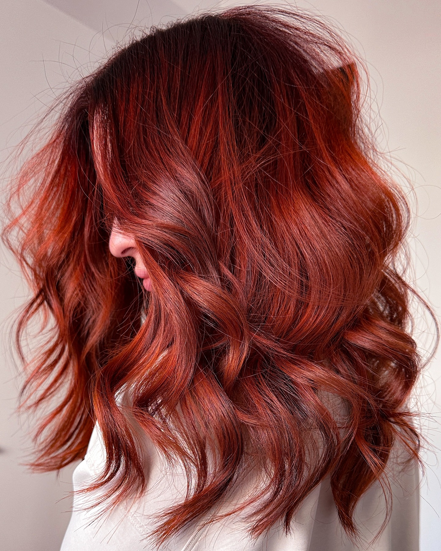7. Rich Mahogany-Copper with Textured Waves - Copper Hair Color Ideas for Women