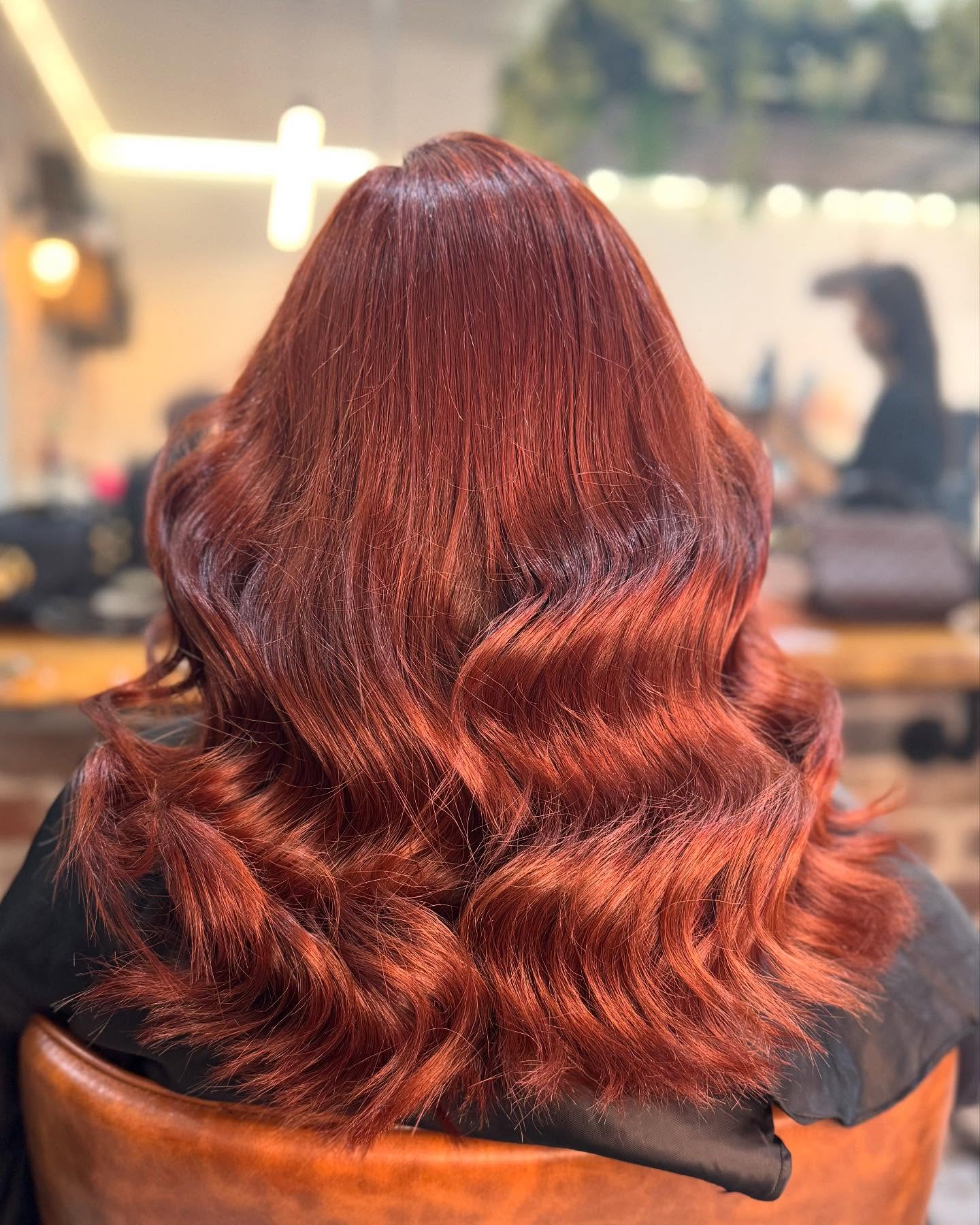 10. Deep Ruby Copper with Sculpted Curls - Copper Hair Color Ideas for Women