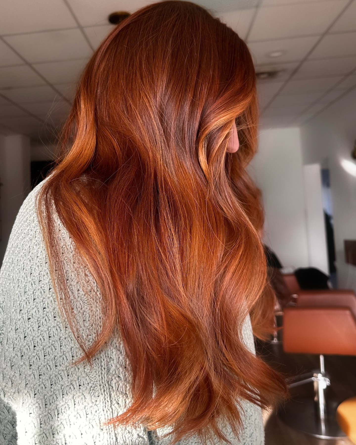 13. Lustrous Burnt Copper with Face-Framing Highlights - Copper Hair Color Ideas for Women