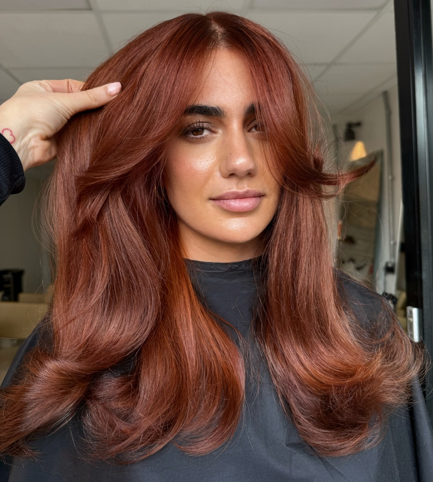 16. Soft Cinnamon Copper with Full Volume Blowout - Copper Hair Color Ideas for Women