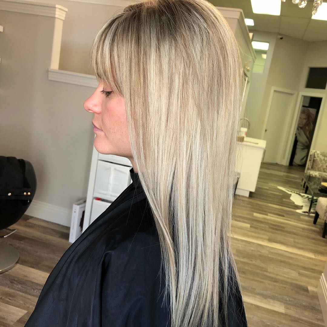 1. Sleek Ash Blonde Layers with Fringe - Ash Blonde Hair Color Ideas for Women