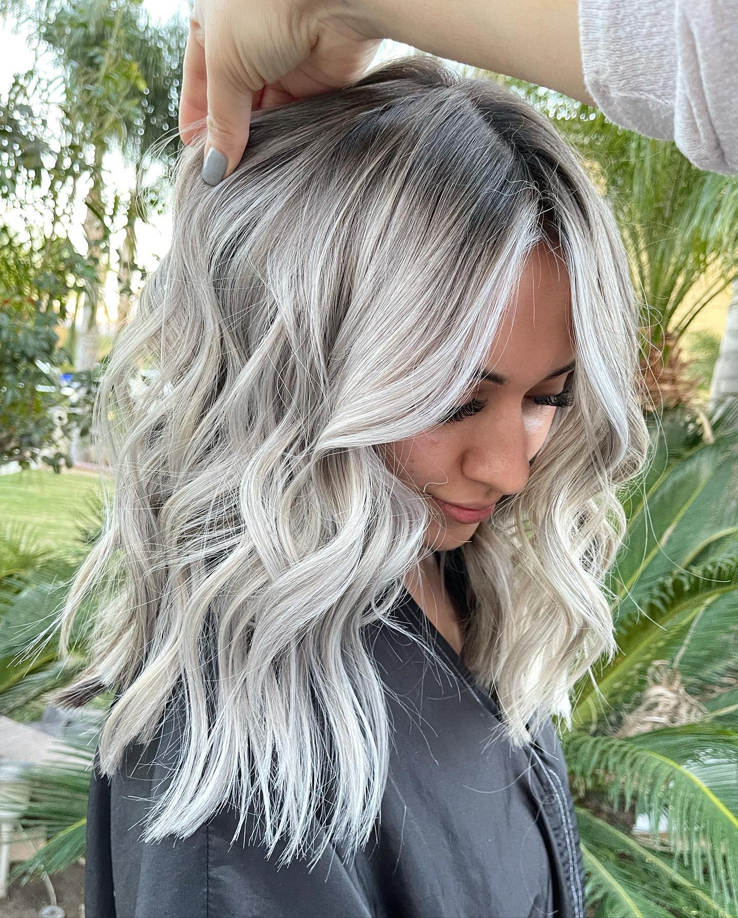 4. Icy Silver Ash with Voluminous Waves - Ash Blonde Hair Color Ideas for Women