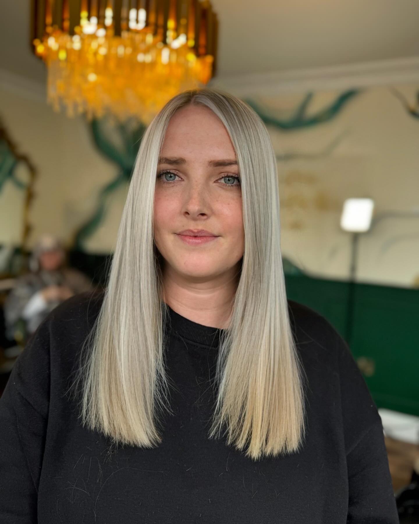 12. Ultra-Cool Platinum Ash Blonde Blowout - Ash Blonde Hair Color Ideas for Women