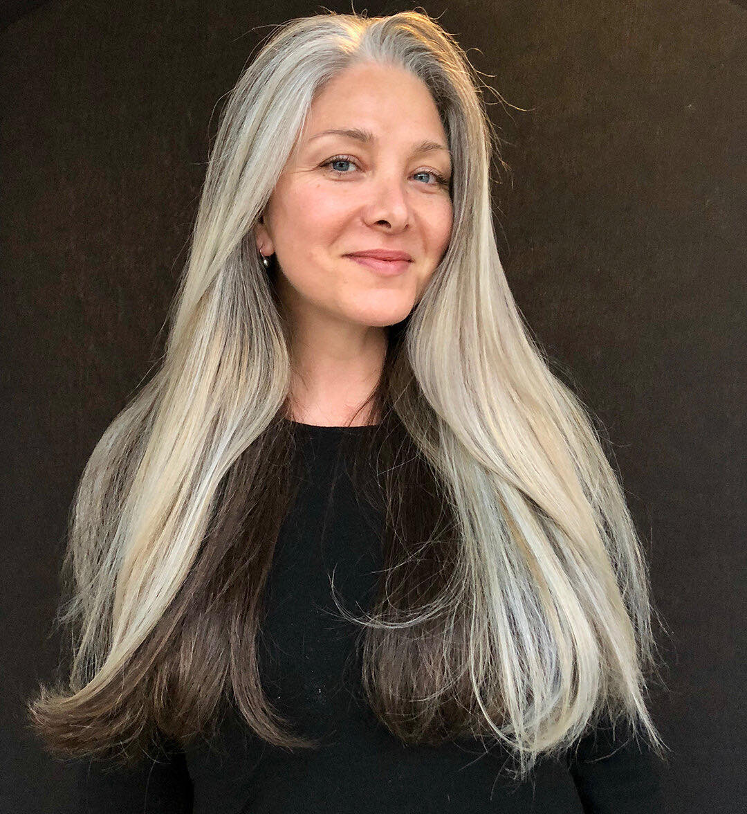 6. Long Silver Streaked Layers - Hairstyles/Haircuts for Older Women