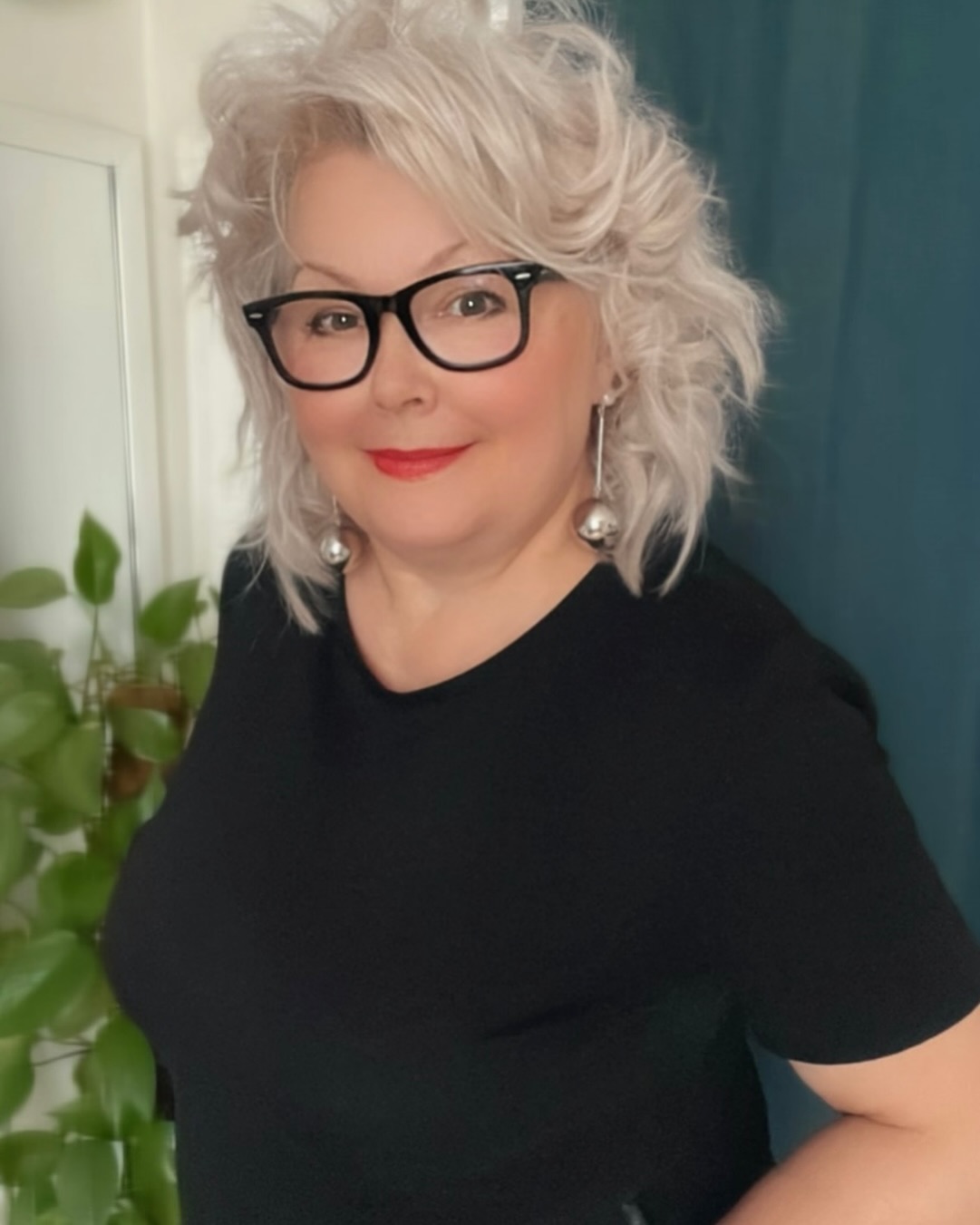 14. Playful Silver Shag - Hairstyles/Haircuts for Older Women