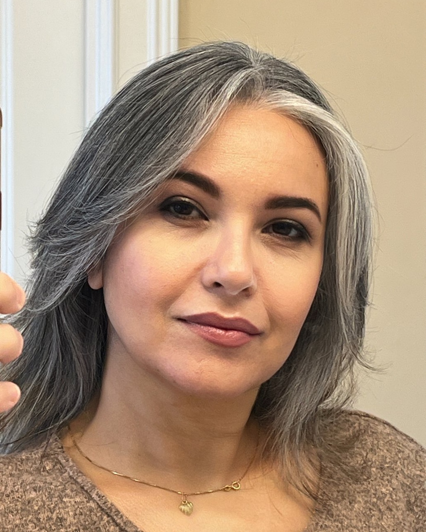 16. Modern Salt and Pepper Lob - Hairstyles/Haircuts for Older Women